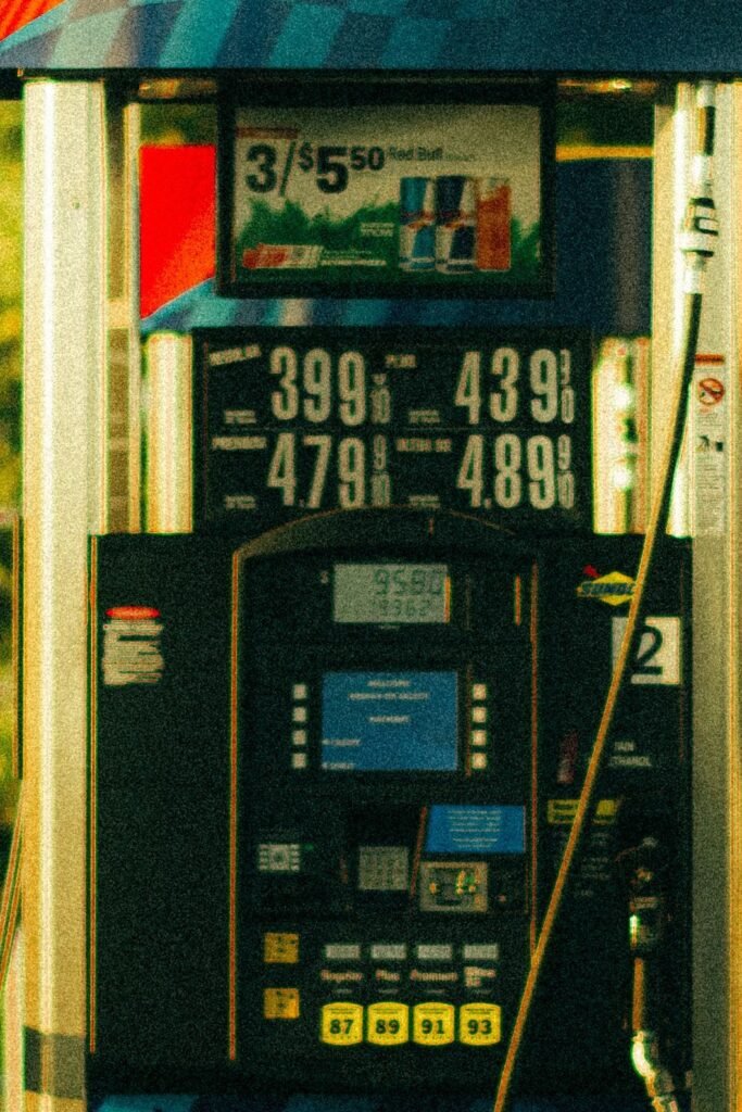 Gas Station price sign showing $3.99, $4.39, $4.79, $4.89 per gallon, illustrating the left-digit effect in pricing